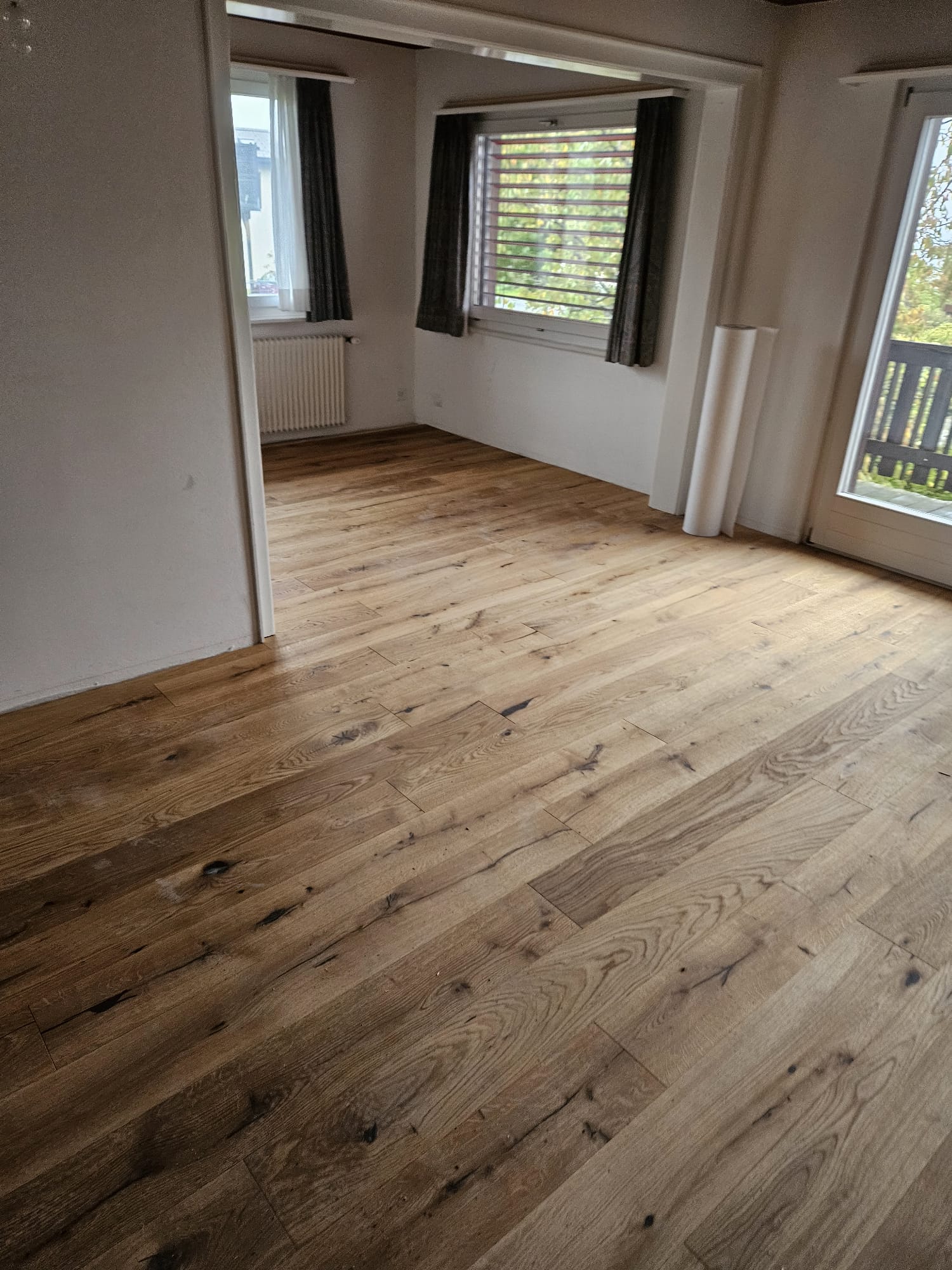 Rénovation d'un sol de séjour en parquet à Crans-Montana